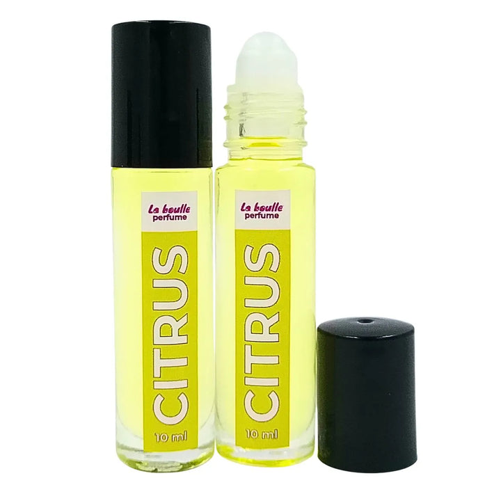 Two bottles of Citrus perfume La Boulle with black caps on a white background