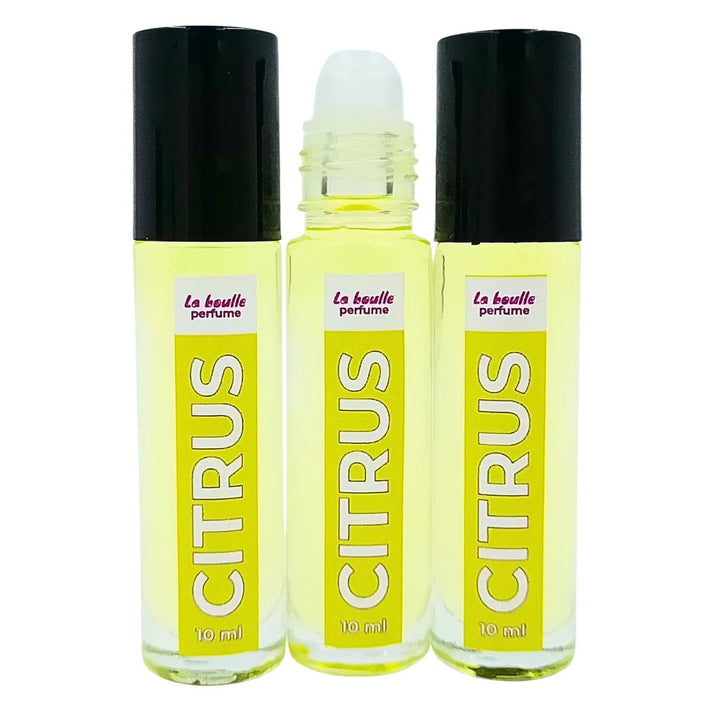 Three bottles of Citrus perfume by 'La Boulle' on a white background