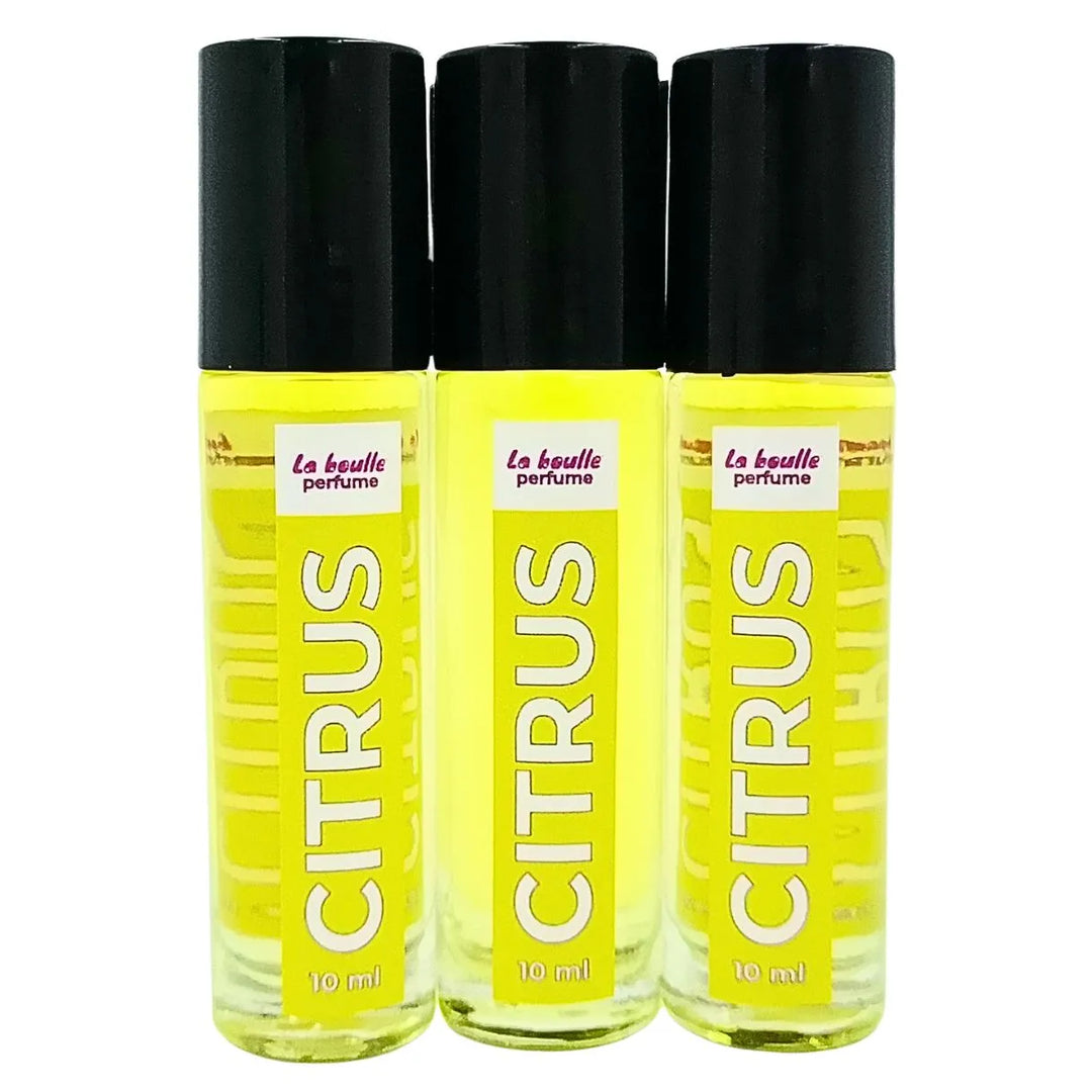 Three bottles of 'La boule' perfume labeled 'Citrus' on a white background