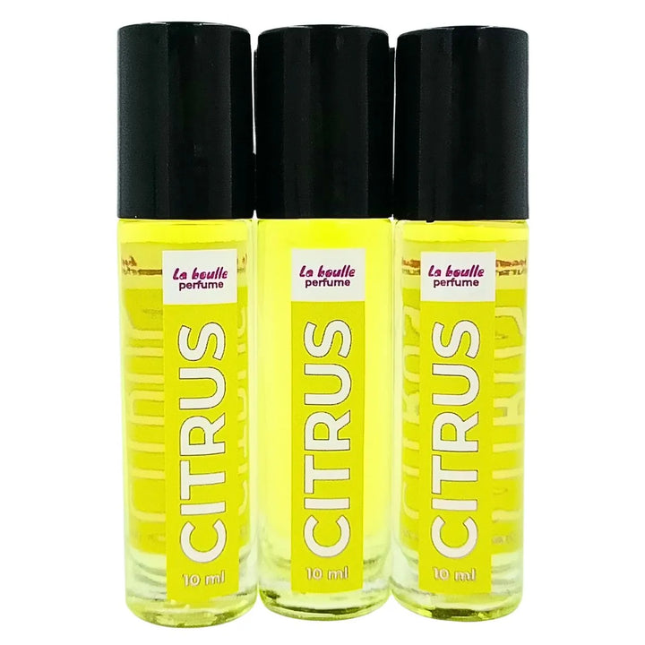 Three bottles of 'La boule' perfume labeled 'Citrus' on a white background