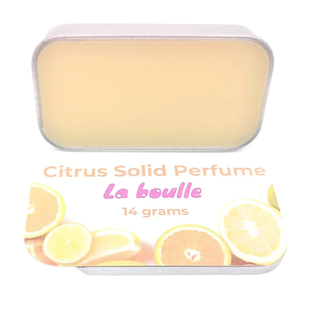 Citrus solid natural perfume balm, La Boulle, on a white background