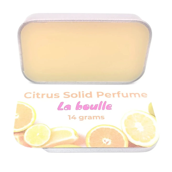 Citrus solid natural perfume balm, La Boulle, on a white background