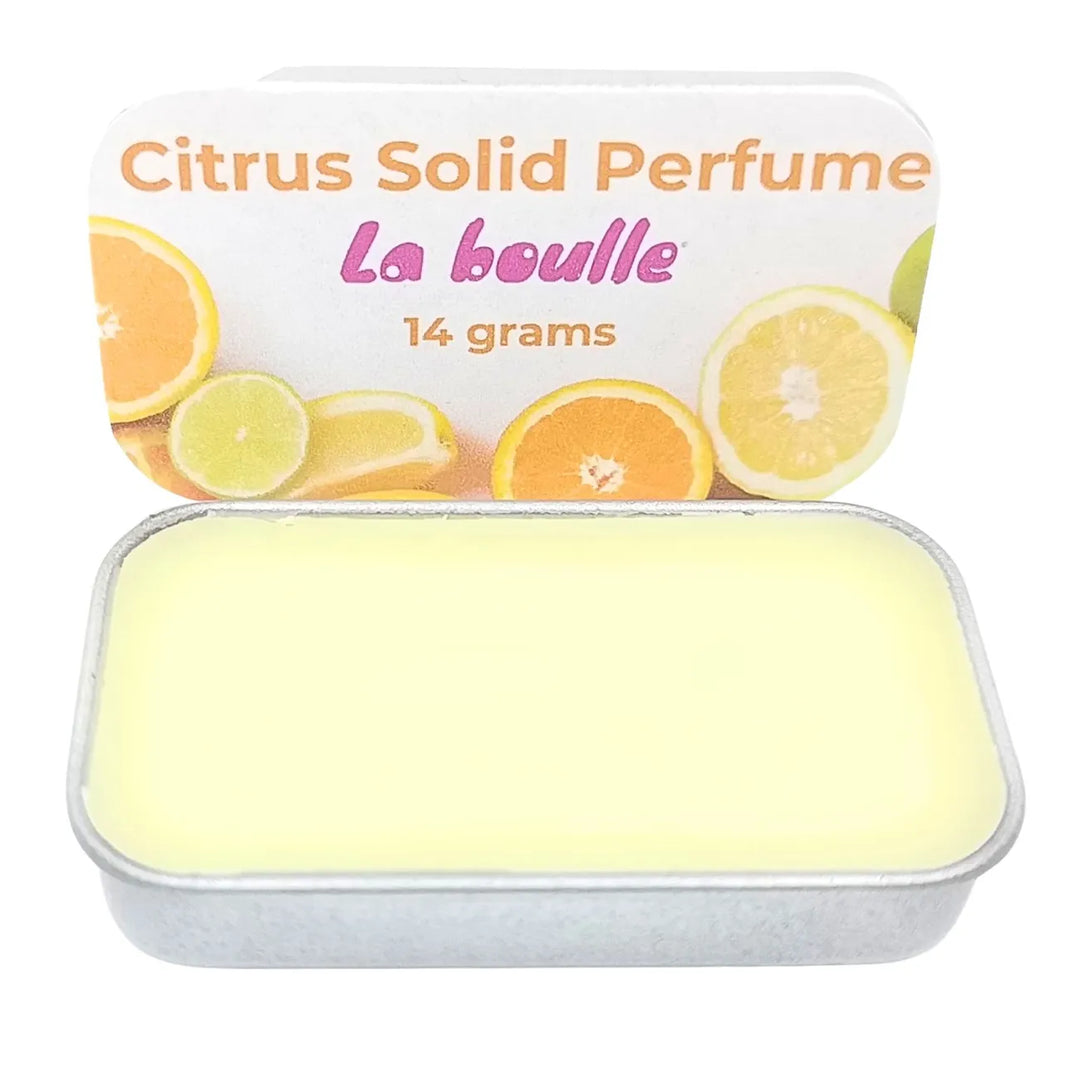 Citrus solid natural perfume balm, La Boulle, on a white background