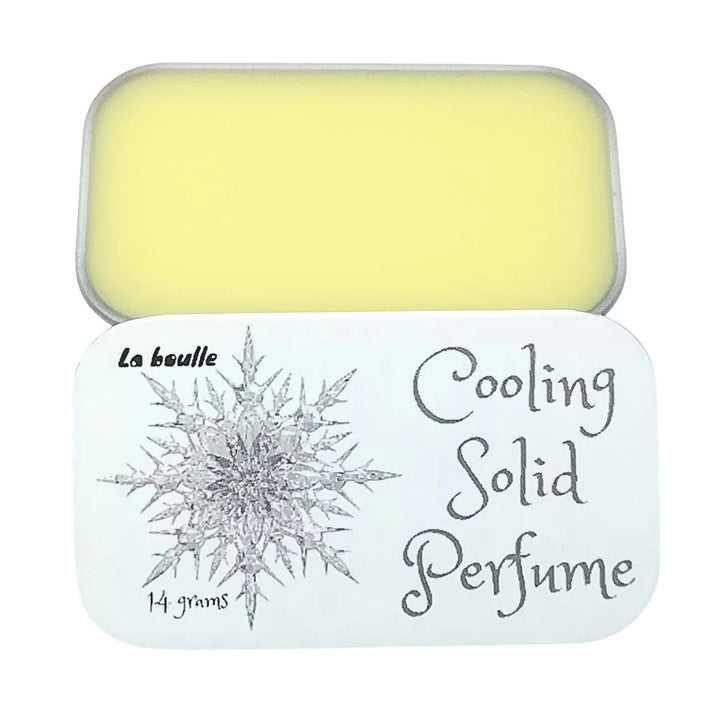 Cooling solid natural perfume balm, La Boulle, on a white background