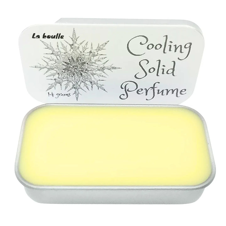 Cooling solid natural perfume balm, La Boulle, on a white background
