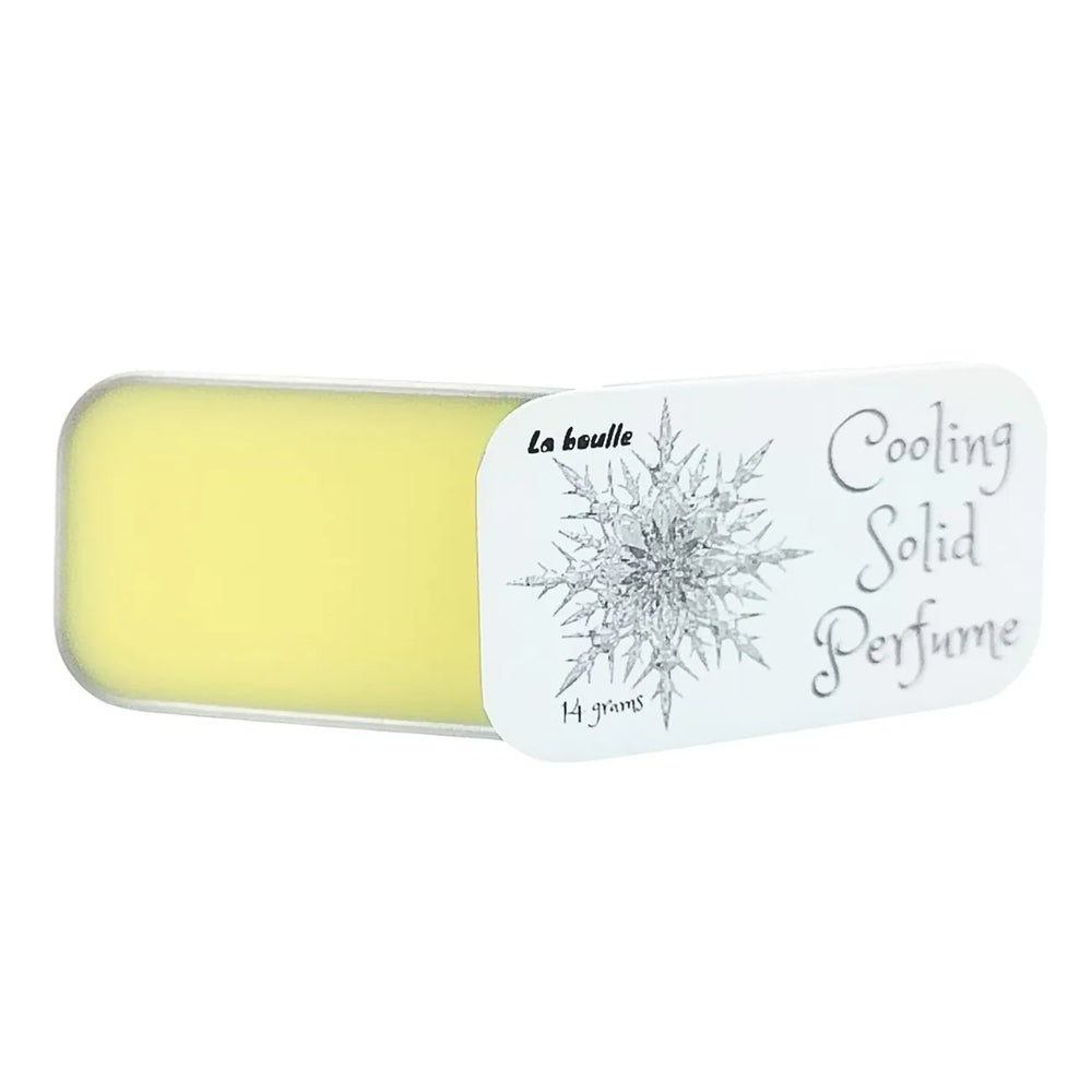 Cooling solid natural perfume balm, La Boulle, on a white background