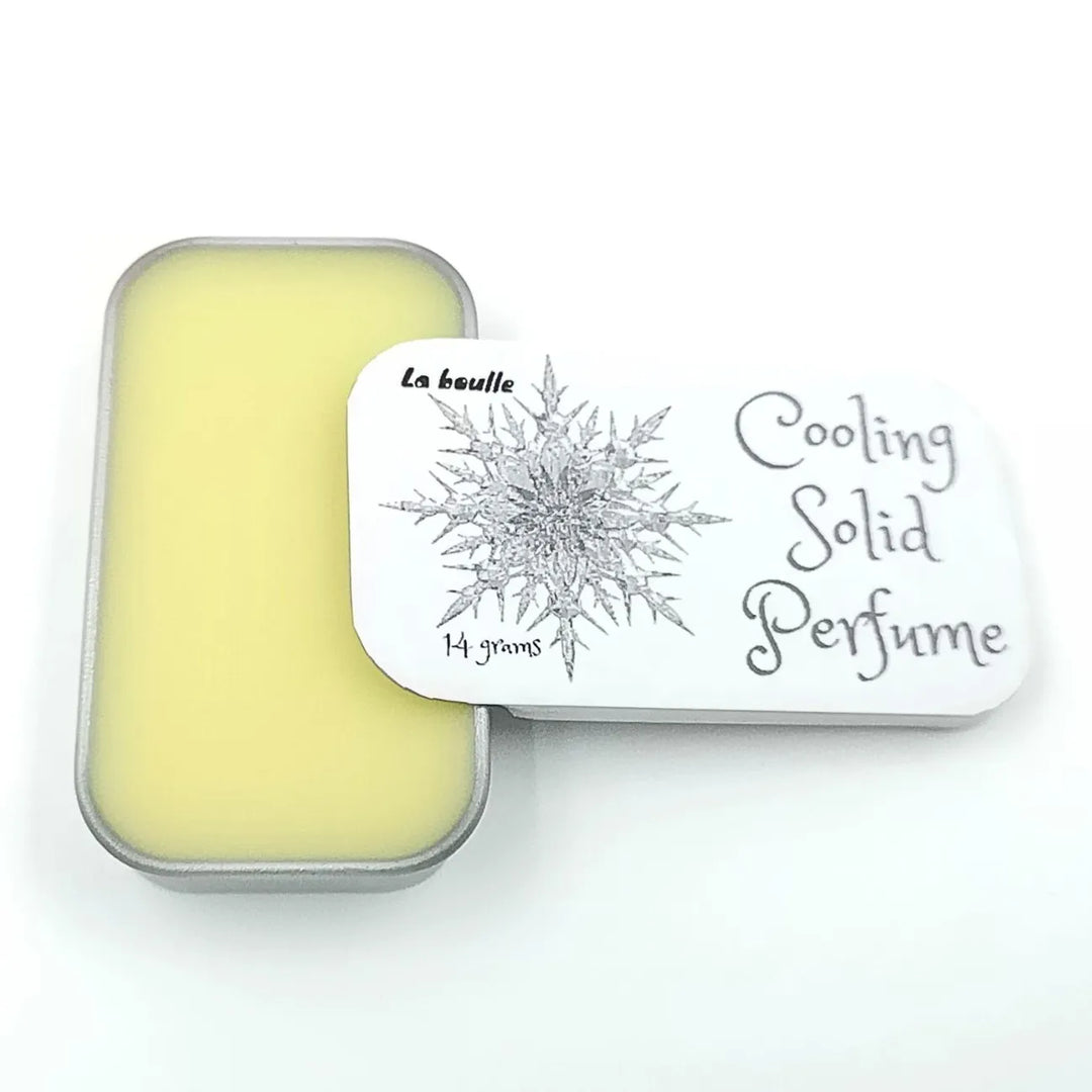 Cooling solid natural perfume balm, La Boulle, on a white background