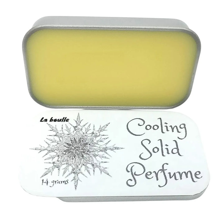 Cooling solid natural perfume balm, La Boulle, on a white background