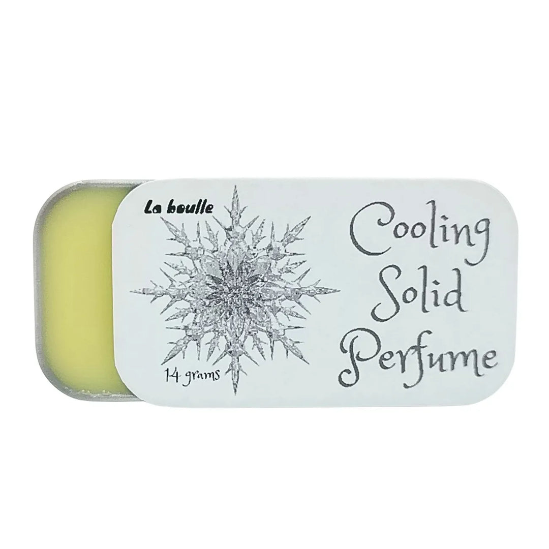 Cooling solid natural perfume balm, La Boulle, on a white background