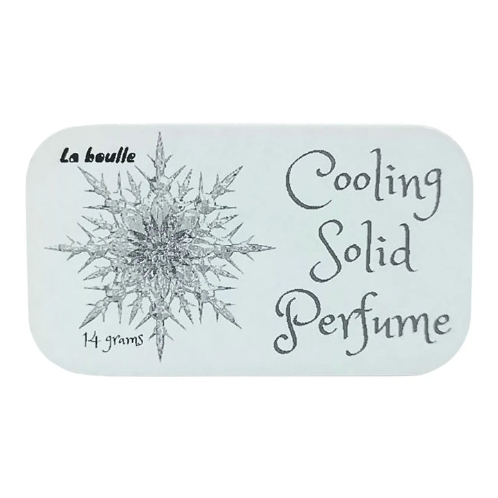 Cooling solid natural perfume balm, La Boulle, on a white background