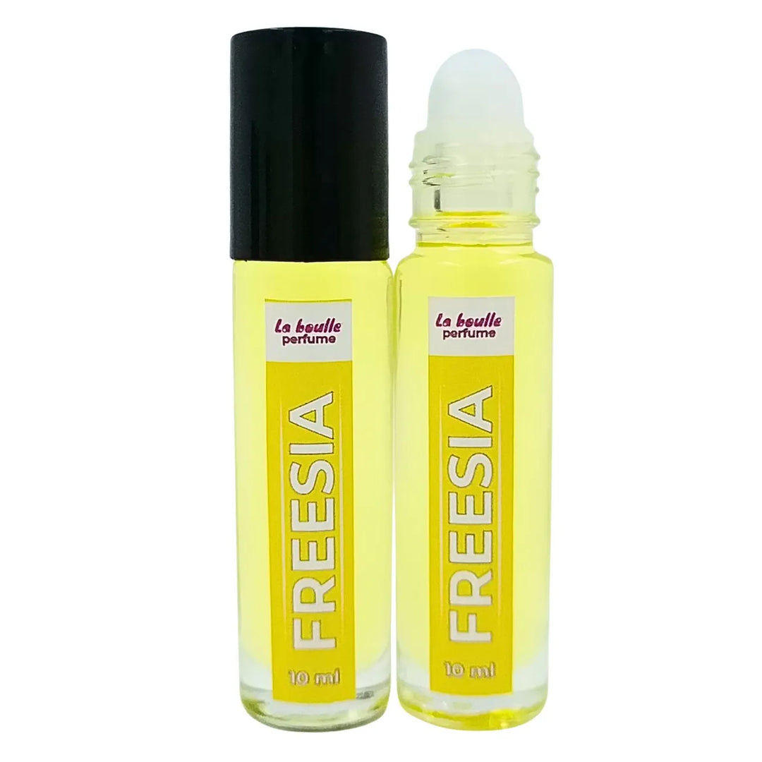 Freesia roll-on perfume bottles La Boulle with black caps on a white background