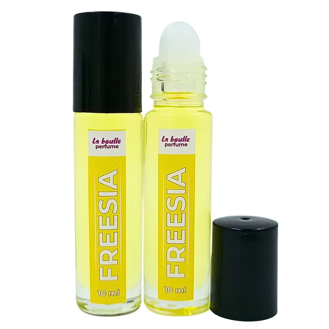 Freesia roll-on perfume bottles La Boulle with black caps on a white background