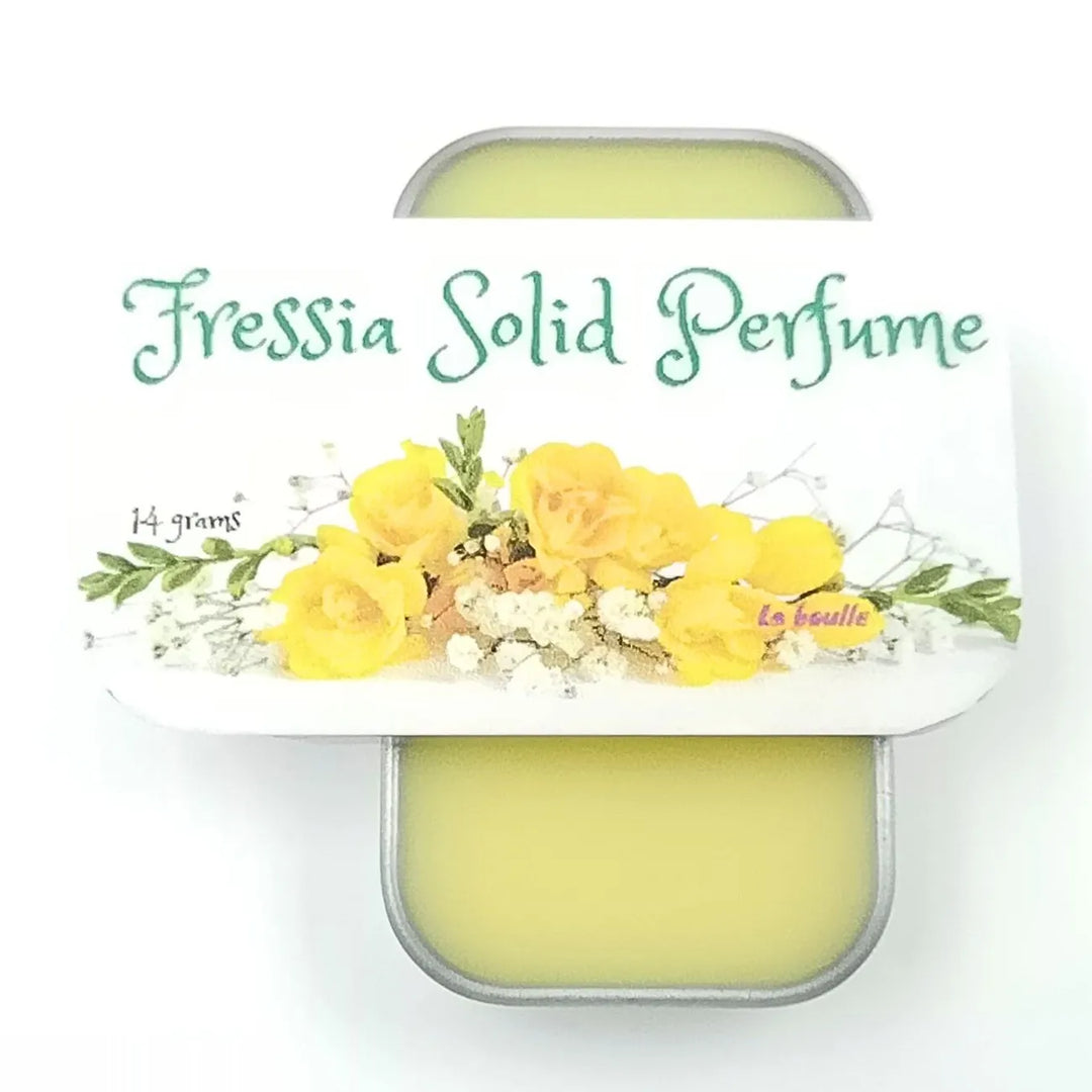 Freesia solid natural perfume balm, La Boulle, on a white background
