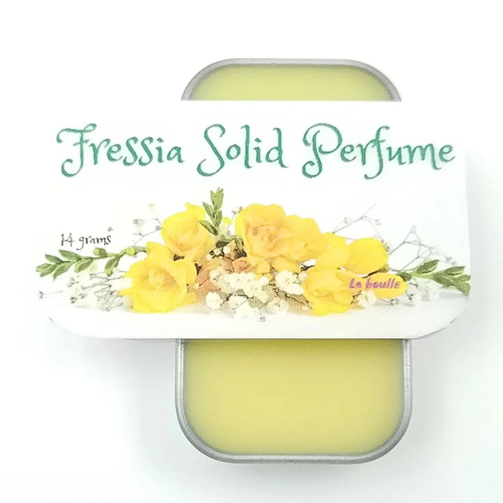 Freesia solid natural perfume balm, La Boulle, on a white background