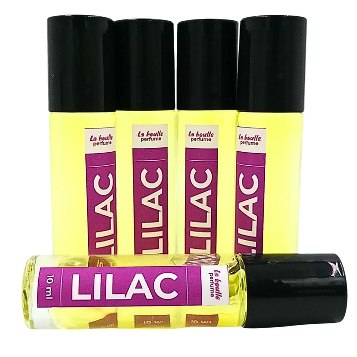 Lilac roll-on perfume bottles La Boulle with black caps on a white background
