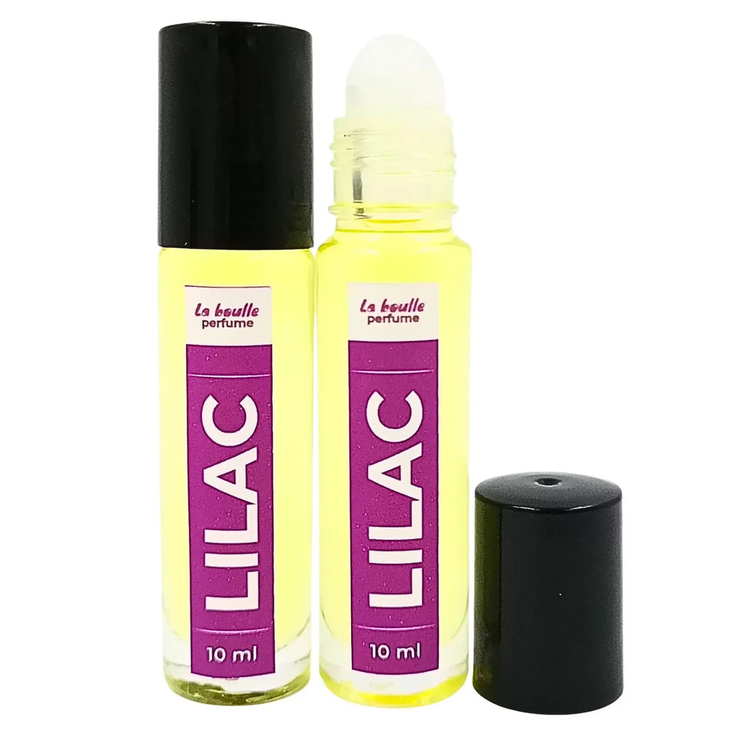 Lilac roll-on perfume bottles La Boulle with black caps on a white background