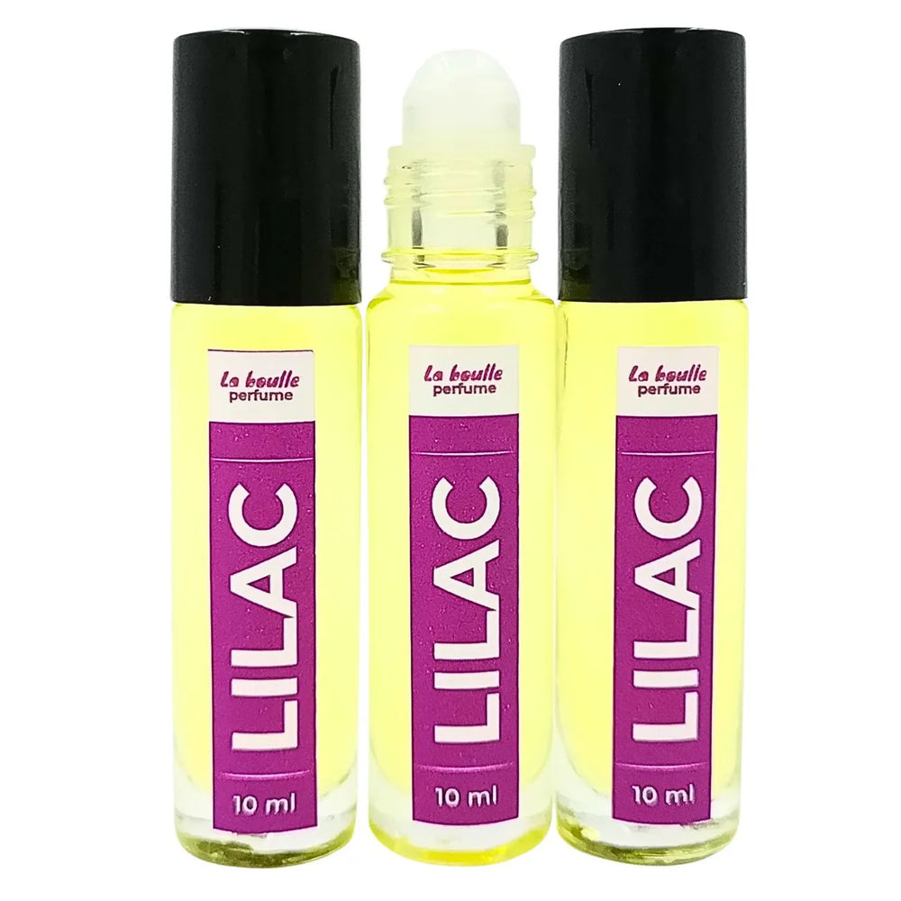 Lilac roll-on perfume bottles La Boulle with black caps on a white background