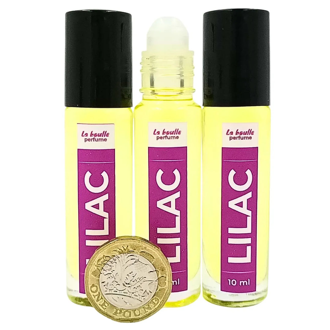 Lilac roll-on perfume bottles La Boulle with black caps on a white background