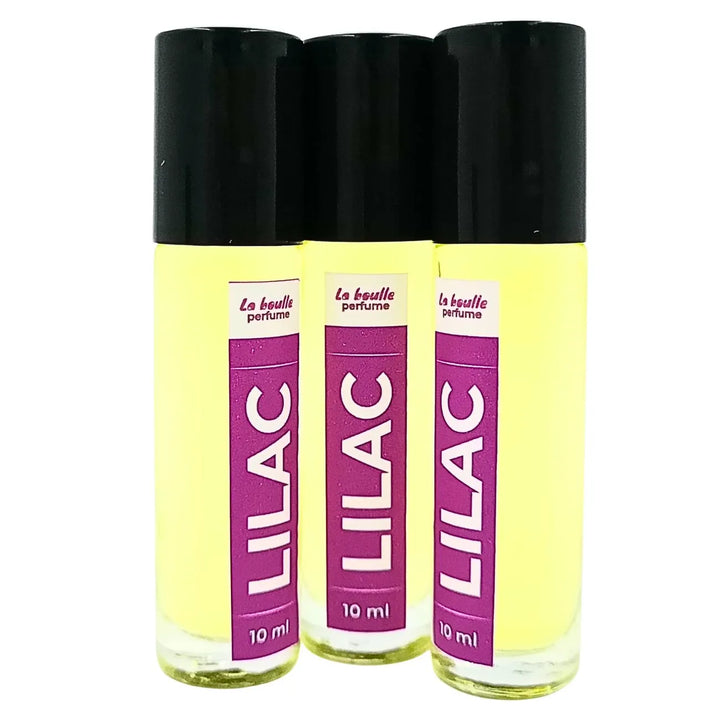 Lilac roll-on perfume bottles La Boulle with black caps on a white background