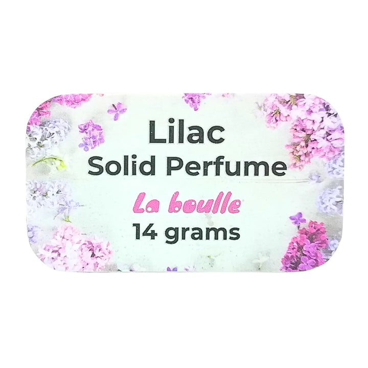 Lilac solid natural perfume balm, La Boulle, on a white background