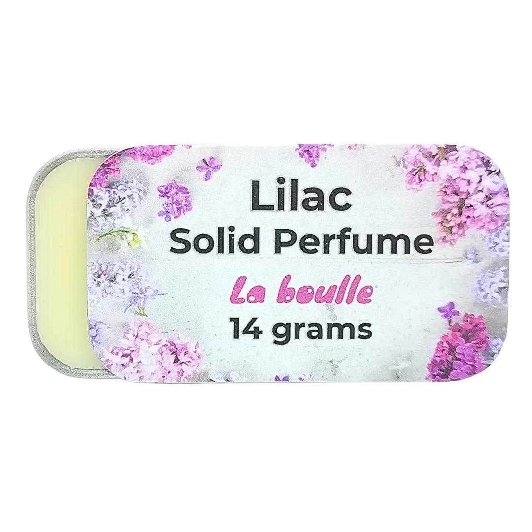 Lilac solid natural perfume balm, La Boulle, on a white background