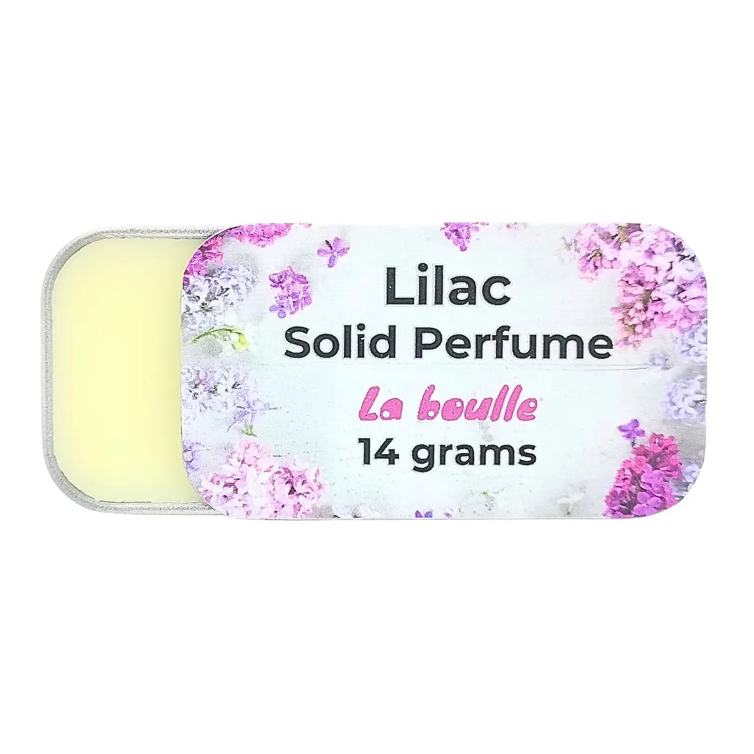 Lilac solid natural perfume balm, La Boulle, on a white background