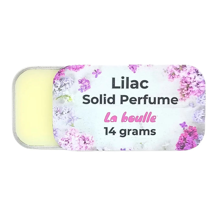 Lilac solid natural perfume balm, La Boulle, on a white background