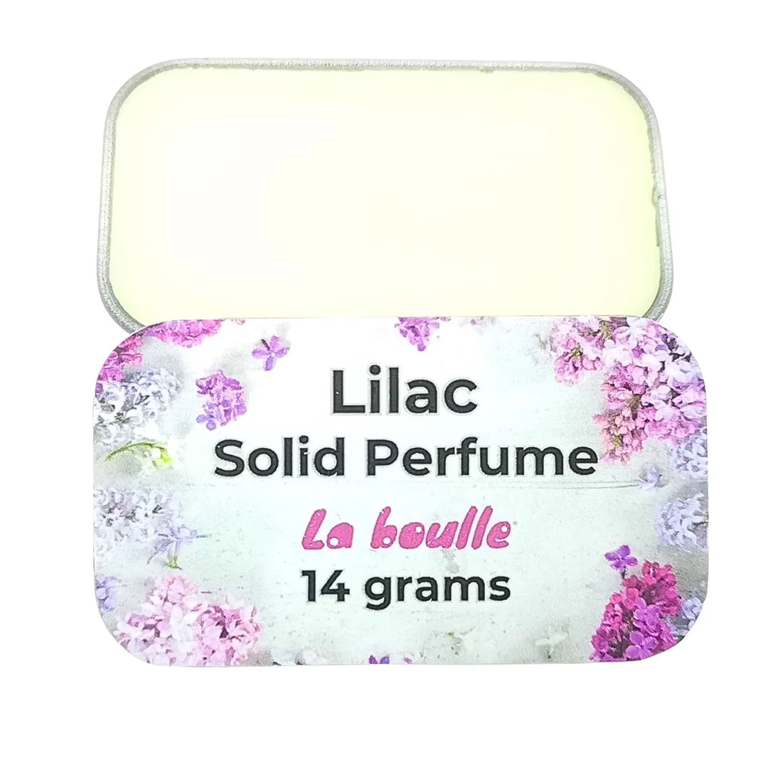 Lilac solid natural perfume balm, La Boulle, on a white background