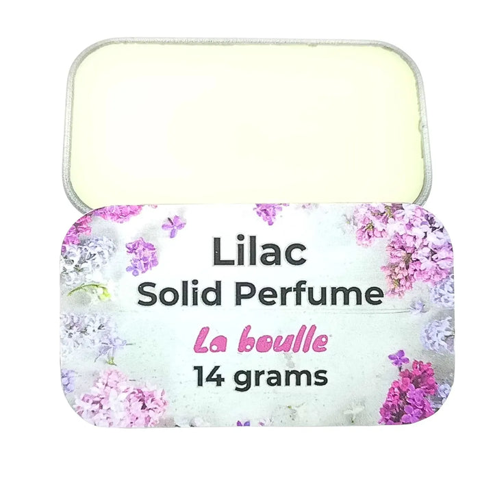 Lilac solid natural perfume balm, La Boulle, on a white background
