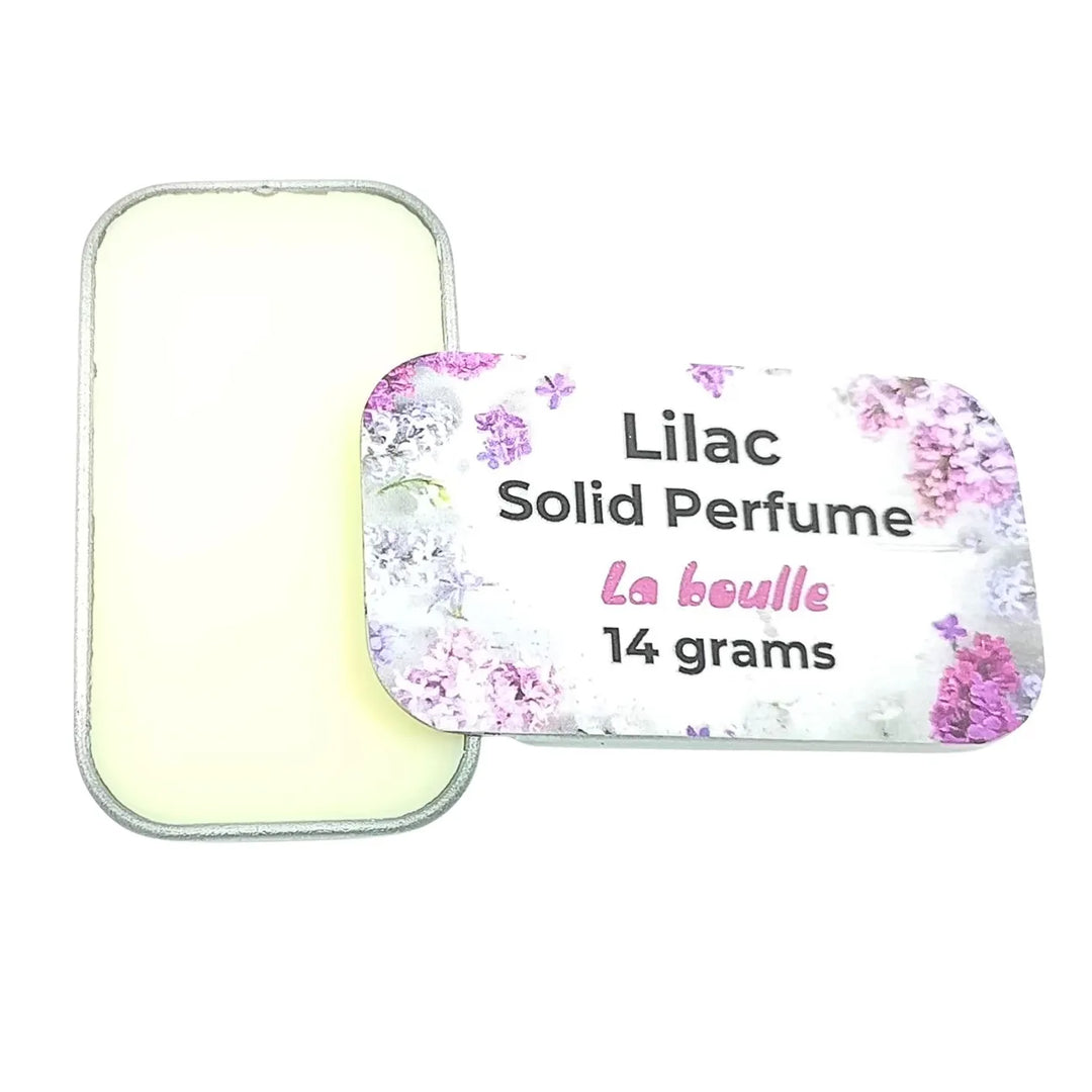Lilac solid natural perfume balm, La Boulle, on a white background