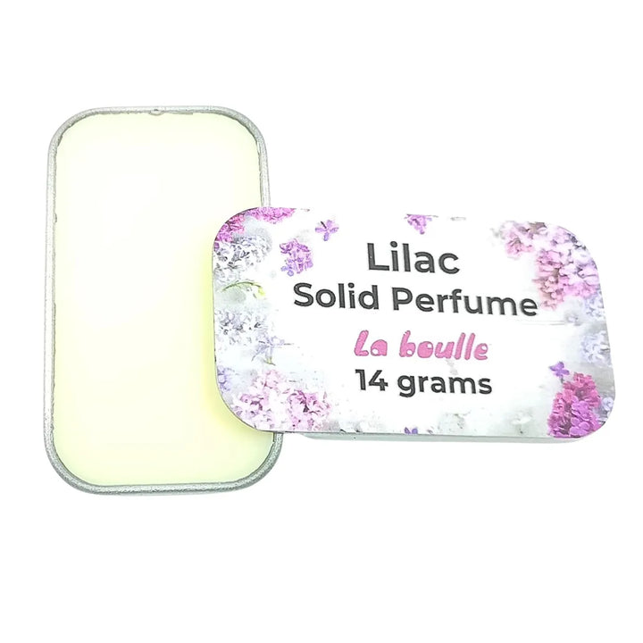 Lilac solid natural perfume balm, La Boulle, on a white background