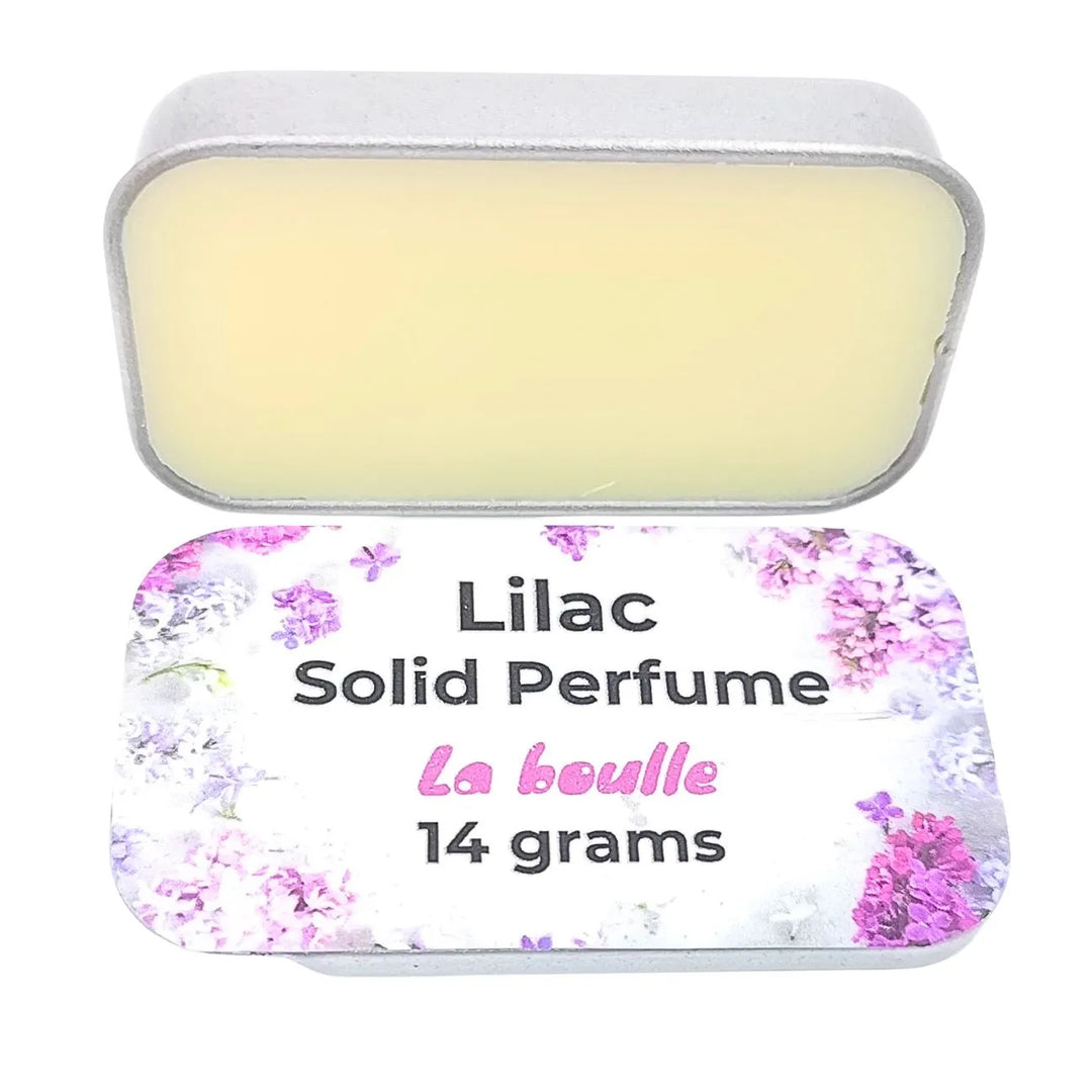 Lilac solid natural perfume balm, La Boulle, on a white background