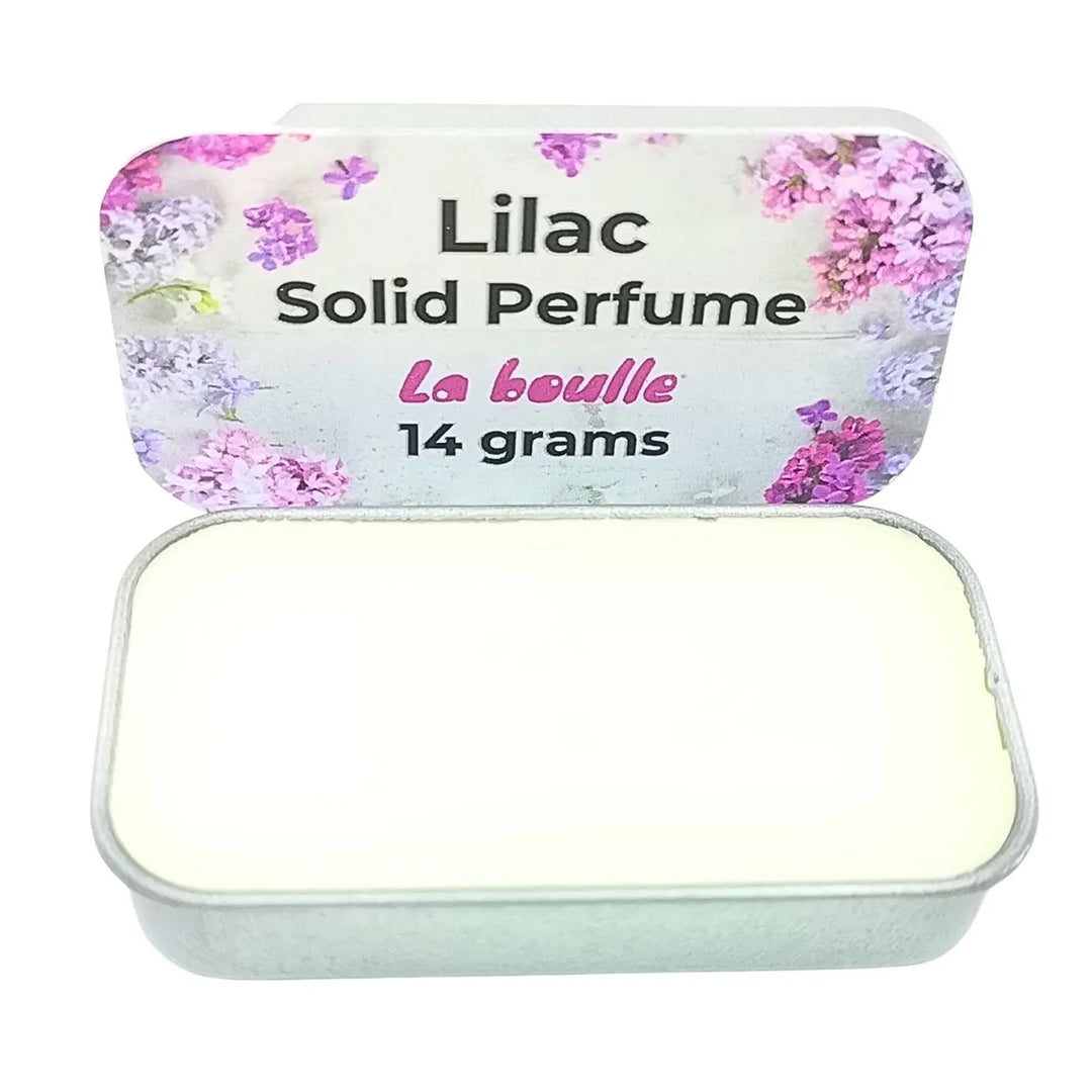 Lilac solid natural perfume balm, La Boulle, on a white background
