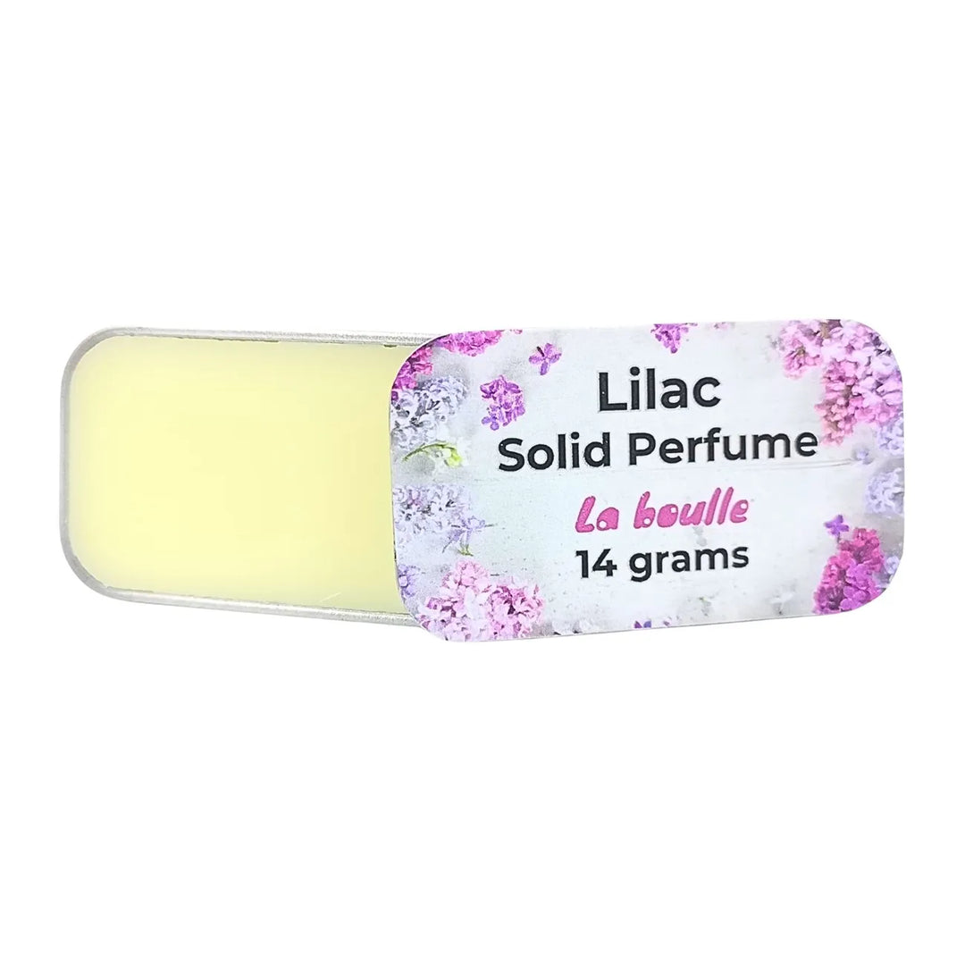 Lilac solid natural perfume balm, La Boulle, on a white background