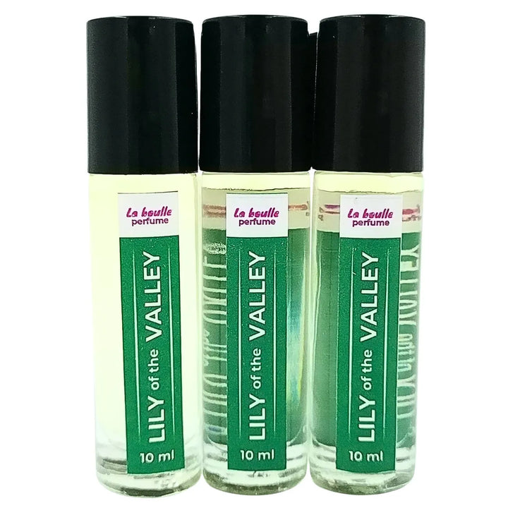 Lily of the valley roll-on perfume bottles La Boulle with black caps on a white background