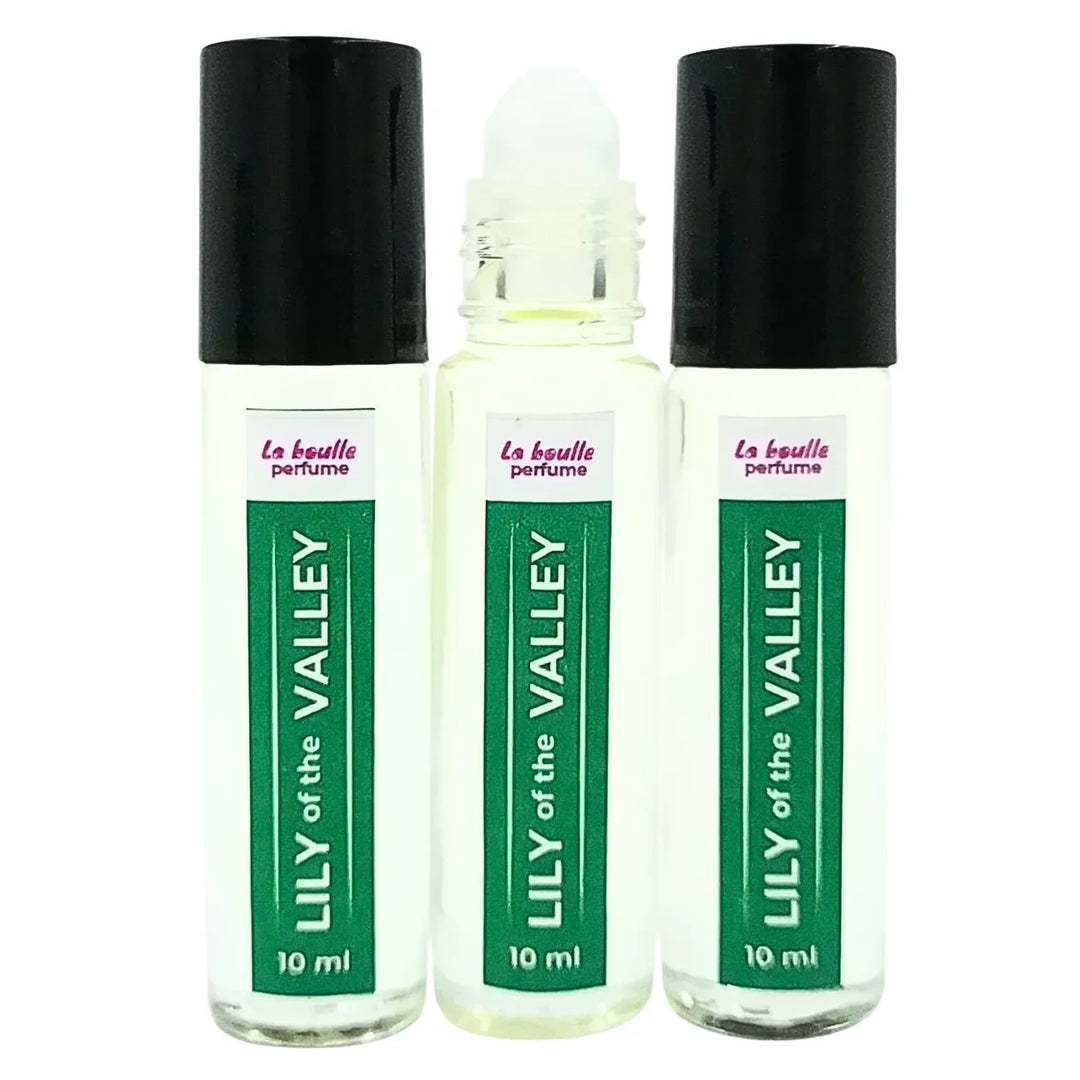 Lily of the valley roll-on perfume bottles La Boulle with black caps on a white background