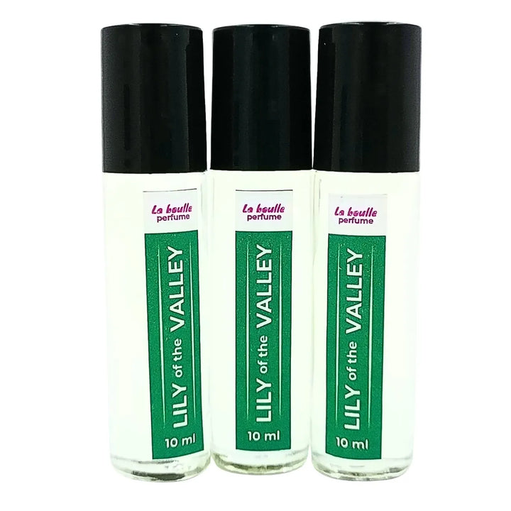 Lily of the valley roll-on perfume bottles La Boulle with black caps on a white background