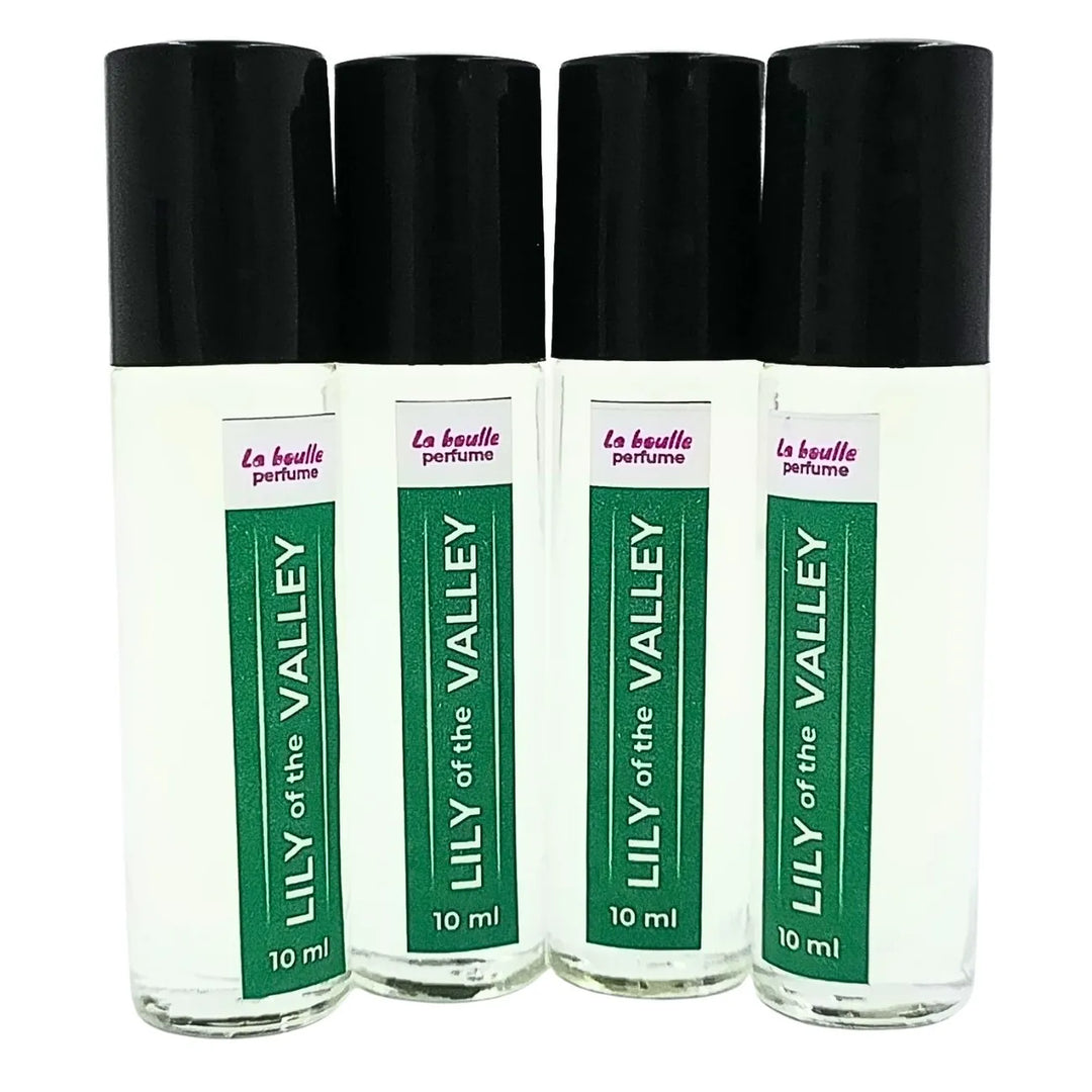 Lily of the valley roll-on perfume bottles La Boulle with black caps on a white background