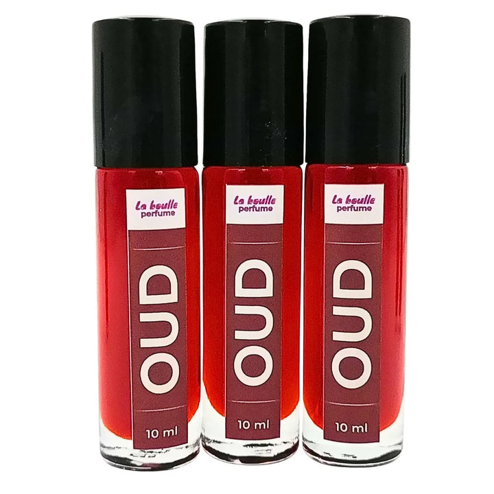 Oud roll-on perfume bottles La Boulle with black caps on a white background