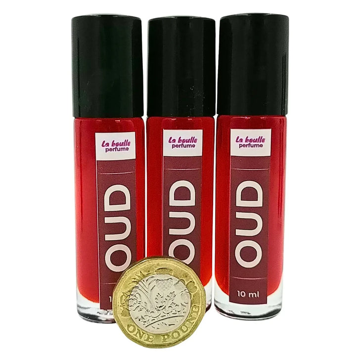 Oud roll-on perfume bottles La Boulle with black caps on a white background