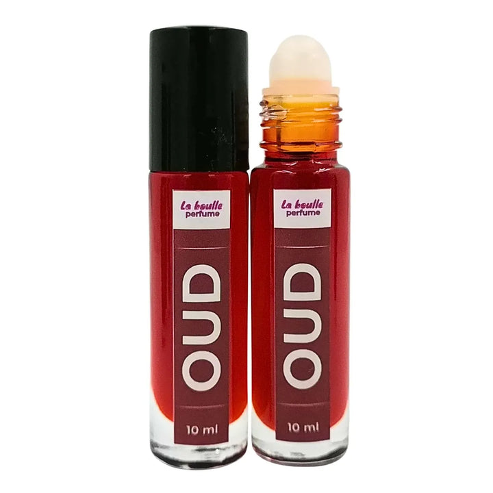Oud roll-on perfume bottles La Boulle with black caps on a white background