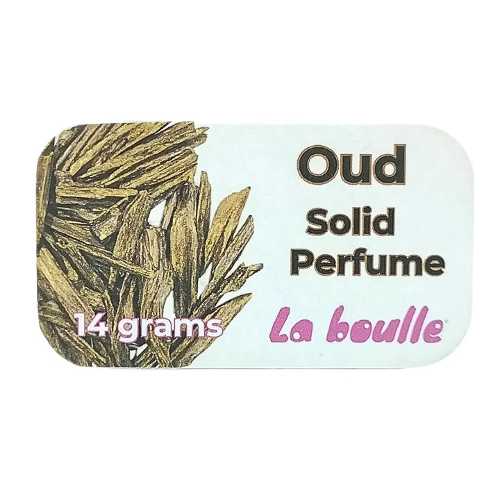 Oud solid natural perfume balm, La Boulle, on a white background