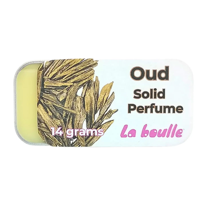 Oud solid natural perfume balm, La Boulle, on a white background