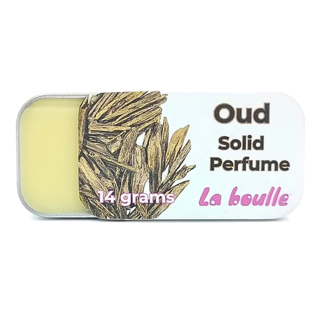 Oud solid natural perfume balm, La Boulle, on a white background