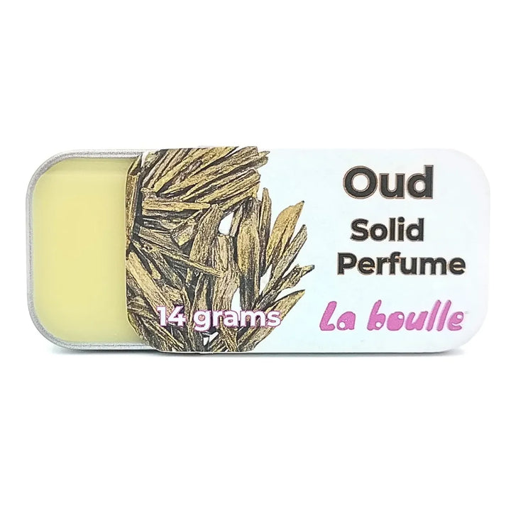Oud solid natural perfume balm, La Boulle, on a white background