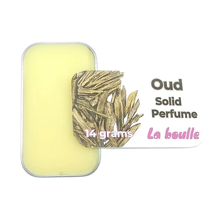 Oud solid natural perfume balm, La Boulle, on a white background
