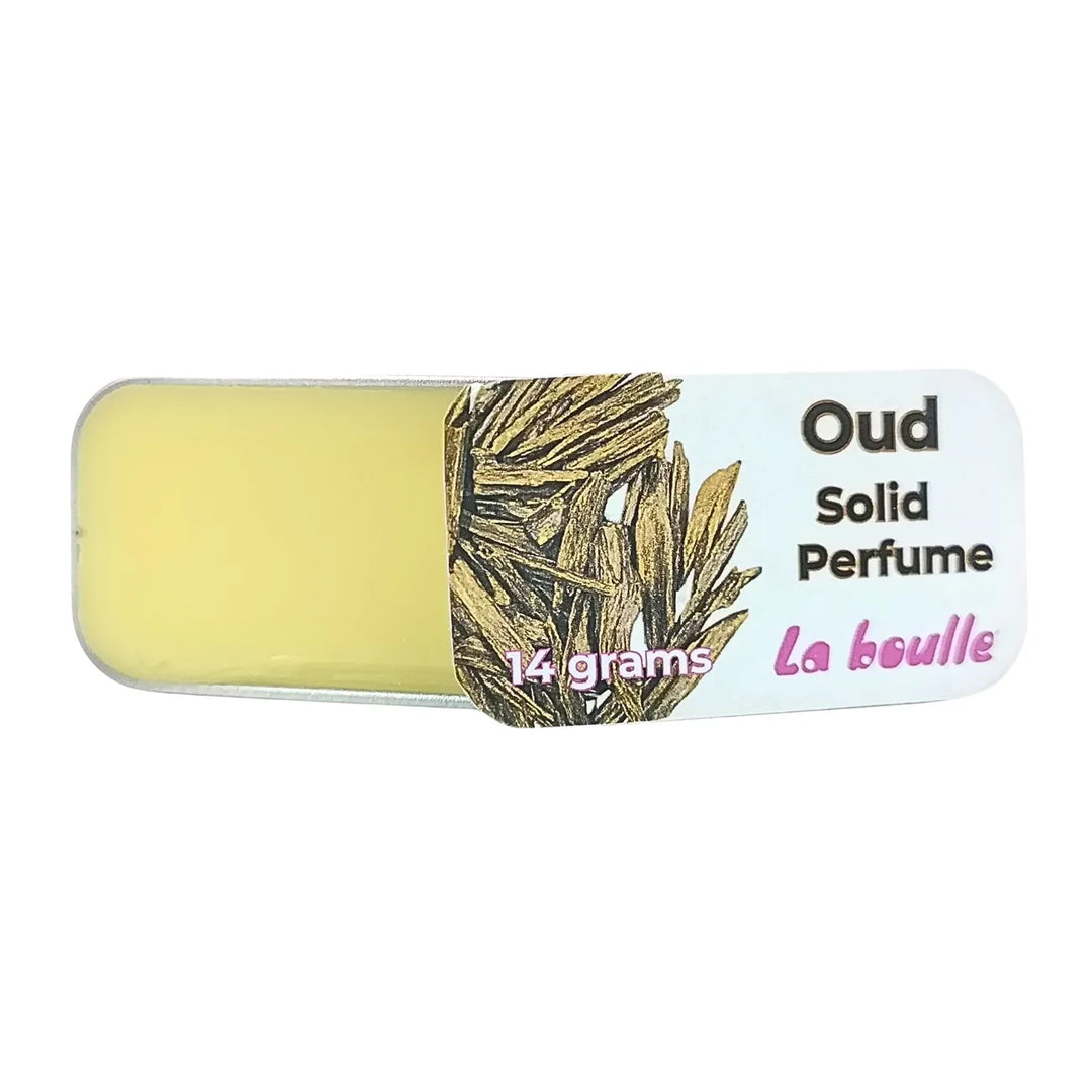 Oud solid natural perfume balm, La Boulle, on a white background