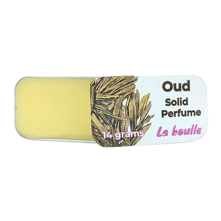 Oud solid natural perfume balm, La Boulle, on a white background