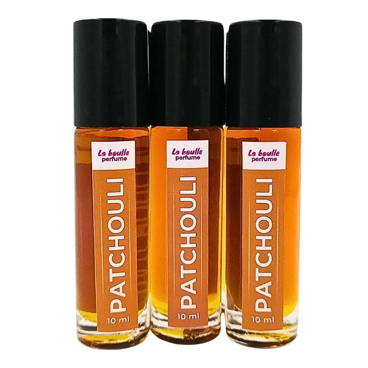 Patchouli roll-on perfume bottles La Boulle with black caps on a white background