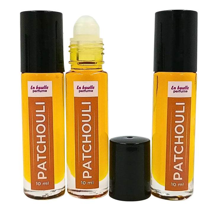 Patchouli roll-on perfume bottles La Boulle with black caps on a white background